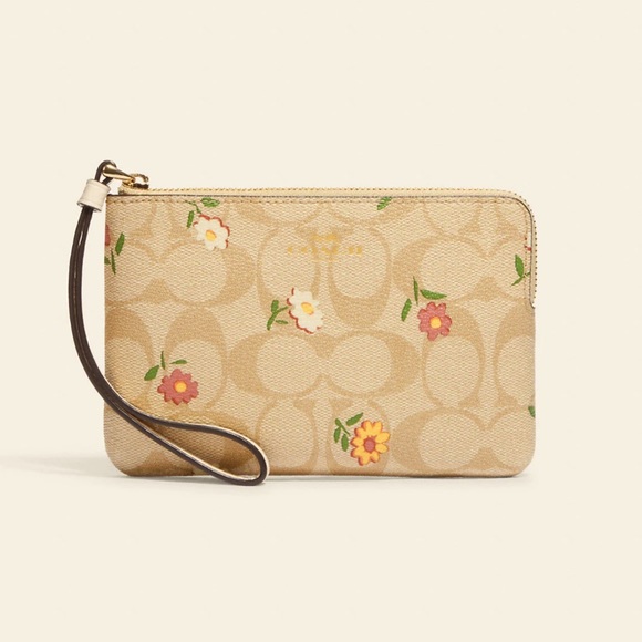 Coach Handbags - NWT Coach Ditsy corner Zip Wristlet In Signature Canvas